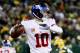 GREEN BAY, WI - JANUARY 8: Eli Manning #10 of the New York Giants throws a pass in the fourth quarter during the NFC Wild Card game against the Green Bay Packers at Lambeau Field on January 8, 2017 in Green Bay, Wisconsin. (Photo by Jonathan Daniel/Getty Images)
