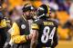 PITTSBURGH, PA - DECEMBER 04: Head Coach Mike Tomlin of the Pittsburgh Steelers talks with Antonio Brown #84 of the Pittsburgh Steelers during a game against the New York Giants on December 4, 2016 in Pittsburgh, Pennsylvania. (Photo by Jamie Sabau/Getty Images)