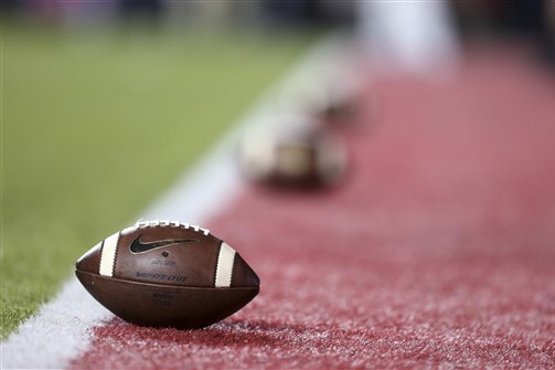 Footballs are lined up in the end zone before an NCAA college football game between Ohio State and Rutgers Saturday, Oct. 24, 2015, in Piscataway, N.J. (AP Photo/Mel Evans)