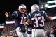 FOXBORO, MA - JANUARY 14: Dion Lewis #33 celebrates with Tom Brady #12 of the New England Patriots after scoring a touchdown in the fourth quarter during the AFC Divisional Playoff Game at Gillette Stadium on January 14, 2017 in Foxboro, Massachusetts. (Photo by Jim Rogash/Getty Images)