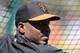 SCOTTSDALE, AZ - MARCH 15: Barry Bonds of the San Francisco Giants watches batting practice before the spring training game against the Oakland Athletics at Scottsdale Stadium on March 15, 2014 in Scottsdale, Arizona. (Photo by Christian Petersen/Getty Images)