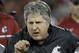 FILE - In this Oct. 8, 2016, file photo, Washington State head coach Mike Leach instructs his team during the second half of an NCAA college football game against Stanford, in Stanford, Calif. Washington State's four-game win streak and return to contention in the Pac-12 can be attributed to the Cougars determination to run the ball on offense. History shows that when Mike Leach's teams are having their most success, running the ball is a huge reason why. (AP Photo/Marcio Jose Sanchez, File)