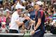 MELBOURNE, AUSTRALIA - JANUARY 20: Andy Murray of Great Britain is congratulated by Sam Querrey of the United States after winning their third round match on day five of the 2017 Australian Open at Melbourne Park on January 20, 2017 in Melbourne, Australia. (Photo by Scott Barbour/Getty Images)
