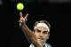 MELBOURNE, AUSTRALIA - JANUARY 20: Roger Federer of Switzerland serves in his third round match against Thomas Berdych of the Czech Republic on day five of the 2017 Australian Open at Melbourne Park on January 20, 2017 in Melbourne, Australia. (Photo by Cameron Spencer/Getty Images)