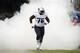 Tennessee Titans tackle Byron Bell (76) is introduced before the start of an NFL football game against the Indianapolis Colts Sunday, Sept. 27, 2015, in Nashville, Tenn. (AP Photo/Mark Zaleski)