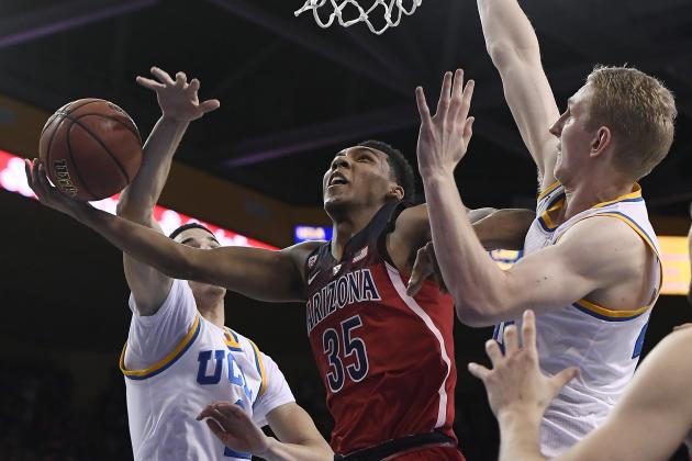 LOS ANGELES, CA - JANUARY 21: Allonzo Trier #35 of the Arizona Wildcats drives to the basket against Lonzo Ball #2 and Thomas Welsh #40 of the UCLA Bruins during the second half of the college basketball game at Pauley Pavilion on January 21, 2017 in Los Angeles, California. (Photo by Kevork Djansezian/Getty Images)