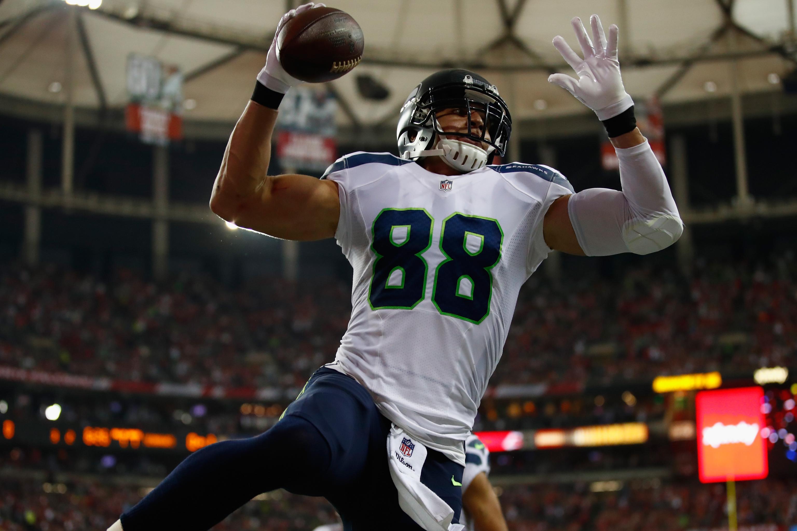 Seattle Seahawks tight end (88) Jimmy Graham gains yards after a