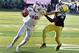 EUGENE, OR - SEPTEMBER 05: Wide receiver Cooper Kupp #10 of the Eastern Washington Eagles stiff arms cornerback Ugo Amadi #14 of the Oregon Ducks on the way to touchdown during the second quarter of the game against the Oregon Ducks at Autzen Stadium on September 5, 2015 in Eugene, Oregon. (Photo by Steve Dykes/Getty Images)