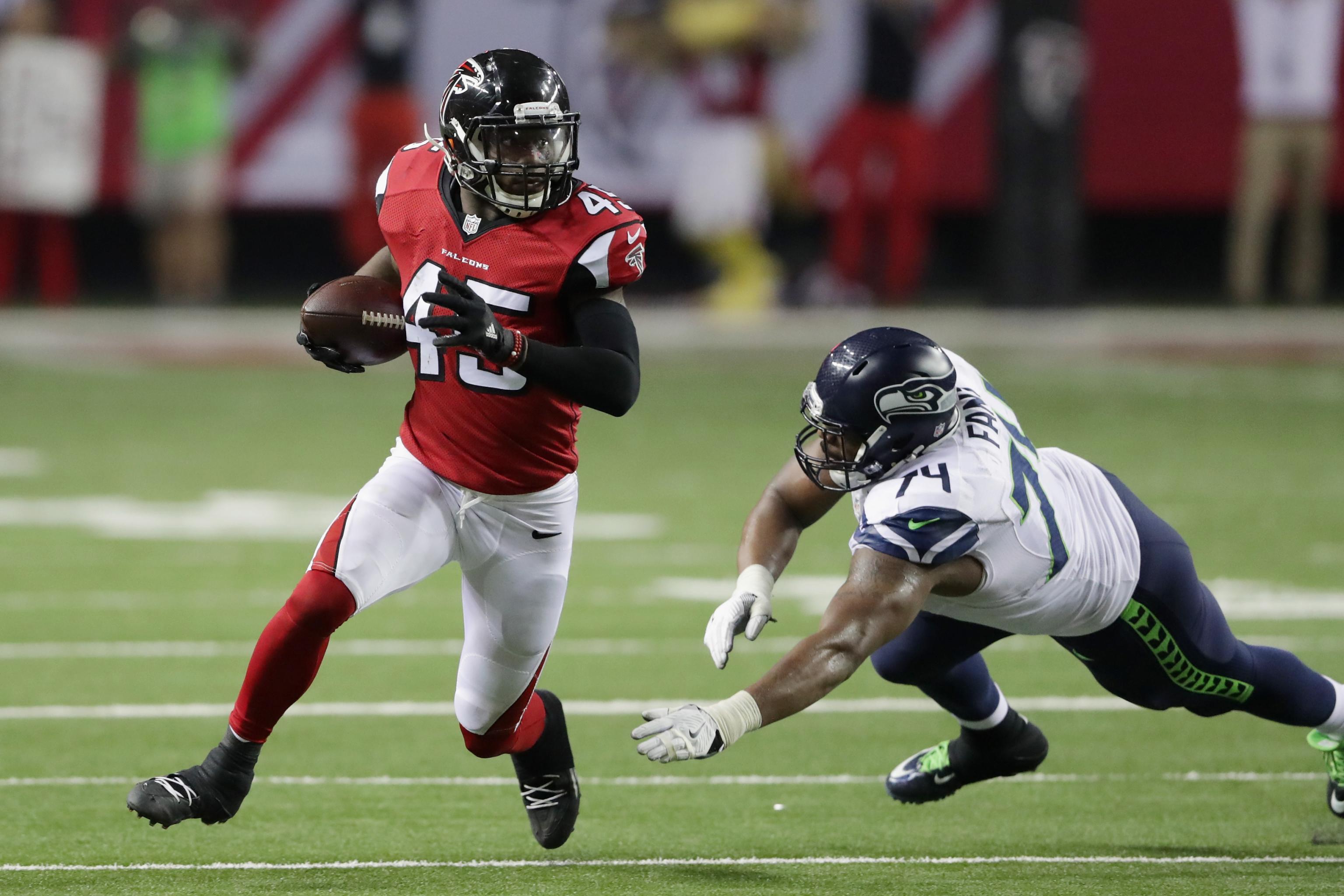 Atlanta Falcons linebacker Deion Jones (45) works against the Jacksonville  Jaguars during the second half of an NFL football game, Sunday, Dec. 22,  2019, in Atlanta. (AP Photo/John Bazemore Stock Photo - Alamy