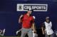 Jon Rahm, of Spain, reacts after making a putt for eagle on the 18th hole of the South Course during the final round of the Farmers Insurance Open golf tournament Sunday, Jan. 29, 2017, at Torrey Pines Golf Course in San Diego. (AP Photo/Gregory Bull)