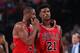 PORTLAND, OR - NOVEMBER 15: Dwyane Wade #3 and Jimmy Butler #21 of the Chicago Bulls talk during the game against the Portland Trail Blazers on November 15, 2016 at the Moda Center Arena in Portland, Oregon. NOTE TO USER: User expressly acknowledges and agrees that, by downloading and or using this photograph, user is consenting to the terms and conditions of the Getty Images License Agreement. Mandatory Copyright Notice: Copyright 2016 NBAE (Photo by Sam Forencich/NBAE via Getty Images)