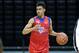 CHARLOTTESVILLE, VA - JUNE 19: Jordan Tucker #43 in red looking to pass the basket during the NBPA Top 100 Camp on June 19, 2015 at John Paul Jones Arena in Charlottesville, Virginia. (Photo by Kelly Kline/Getty Images)