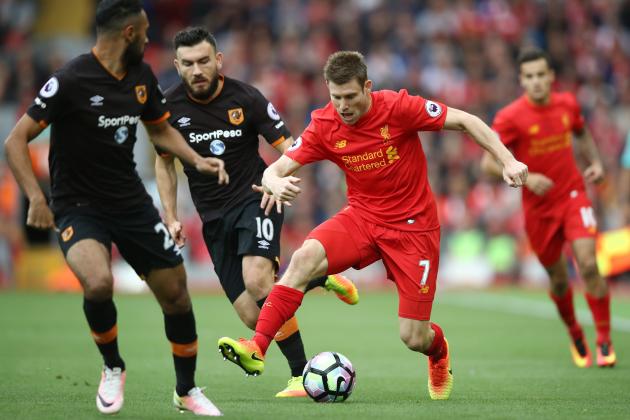 LIVERPOOL, ENGLAND - SEPTEMBER 24:  James Milner of Liverpool evades Robert Snodgrass of Hull City during the Premier League match between Liverpool and Hull City at Anfield on September 24, 2016 in Liverpool, England.  (Photo by Julian Finney/Getty Images)
