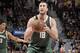 CLEVELAND, OH - DECEMBER 21: Miles Plumlee #18 of the Milwaukee Bucks shoots a free throw against the Cleveland Cavaliers on December 21, 2016 at Quicken Loans Arena in Cleveland, Ohio. NOTE TO USER: User expressly acknowledges and agrees that, by downloading and/or using this Photograph, user is consenting to the terms and conditions of the Getty Images License Agreement. Mandatory Copyright Notice: Copyright 2015 NBAE (Photo by David Liam Kyle/NBAE via Getty Images)