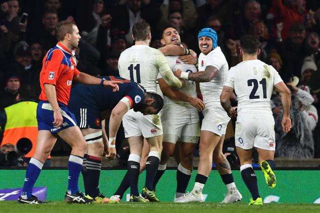 England's Danny Care (3rd R) celebrates with teammates after scoring England's first try during the Six Nations international rugby union match between England and France at Twickenham stadium in southwest London on February 4, 2017. / AFP / Ben STANSALL        (Photo credit should read BEN STANSALL/AFP/Getty Images)