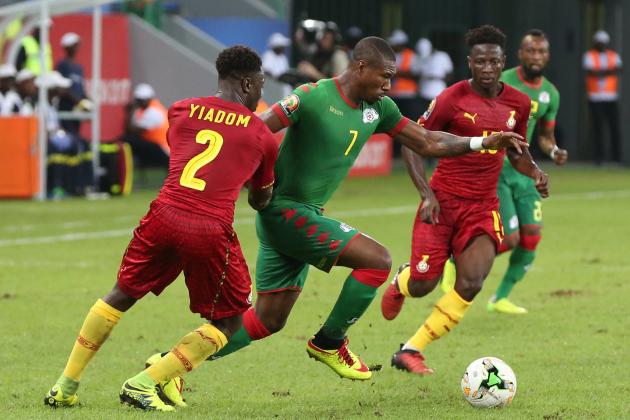 Burkina Faso's midfielder Prejuce Nakoulma (C) challenges Ghana's defender Andy Yiadom (L) and Ghana's midfielder Ebenezer Ofori during the 2017 Africa Cup of Nations third place football match between Burkina Faso and Ghana in Port-Gentil on February 4, 2017. / AFP / Steve JORDAN (Photo credit should read STEVE JORDAN/AFP/Getty Images)