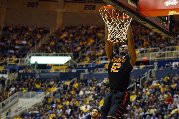 MORGANTOWN, WV - FEBRUARY 04:  Cameron McGriff #12 of the Oklahoma State Cowboys dunks the ball against the West Virginia Mountaineers at the WVU Coliseum on February 4, 2017 in Morgantown, West Virginia.  (Photo by Justin K. Aller/Getty Images)