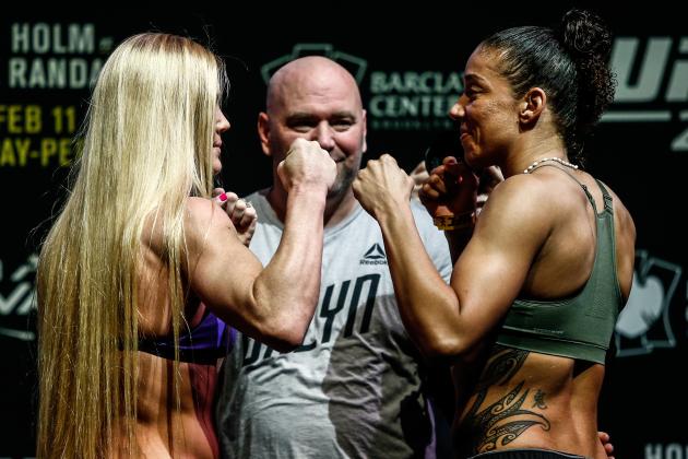 NEW YORK, NY - FEBRUARY 10: Holly Holm(left) and Germaine de Randamie (right) faces off after weighing in for the inaugural women's featherweight championship fight during the UFC 208 weigh-in inside Kings Theater on February 10, 2017 in the Brooklyn borough of New York.(Photo by Anthony Geathers/Getty Images)
