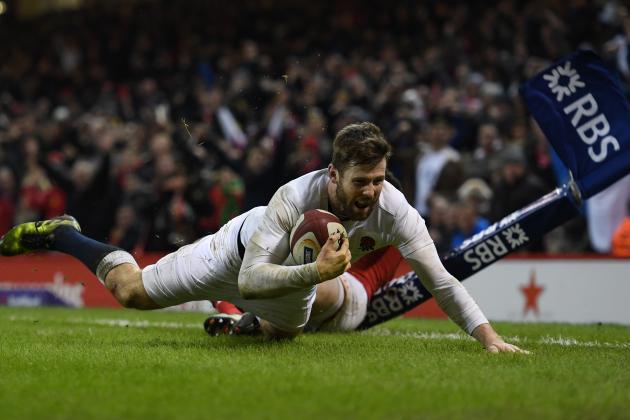 CARDIFF, WALES - FEBRUARY 11:  Elliot Daly of England dives past Alex Cuthbert of Wales to score the match winning try during the RBS Six Nations match between Wales and England at the Principality Stadium on February 11, 2017 in Cardiff, Wales.  (Photo by Shaun Botterill/Getty Images)