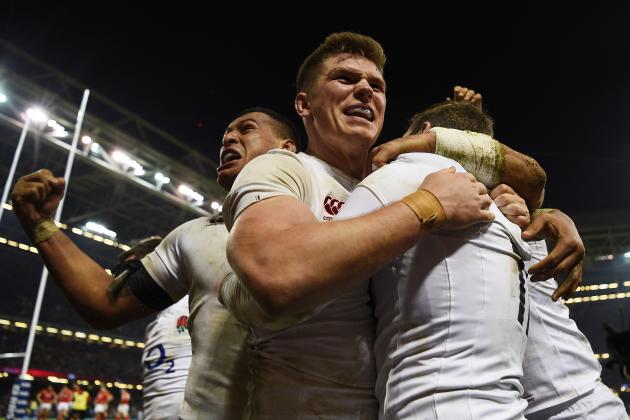 CARDIFF, WALES - FEBRUARY 11:  Elliot Daly of England is congratulated by teammates Nathan Hughes (L) and Owen Farrell (C) of England after scoring the match winning try during the RBS Six Nations match between Wales and England at the Principality Stadium on February 11, 2017 in Cardiff, Wales.  (Photo by Shaun Botterill/Getty Images)