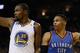 OAKLAND, CA - JANUARY 18: Kevin Durant #35 of the Golden State Warriors and Russell Westbrook #0 of the Oklahoma City Thunder point in different directions after the ball went out of bounds at ORACLE Arena on January 18, 2017 in Oakland, California. NOTE TO USER: User expressly acknowledges and agrees that, by downloading and or using this photograph, User is consenting to the terms and conditions of the Getty Images License Agreement. (Photo by Ezra Shaw/Getty Images)