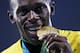 RIO DE JANEIRO, BRAZIL - AUGUST 20: Gold medalist Usain Bolt of Jamaica stands on the podium during the medal ceremony for the Men's 4 x 100 meter Relay on Day 15 of the Rio 2016 Olympic Games at the Olympic Stadium on August 20, 2016 in Rio de Janeiro, Brazil. (Photo by Patrick Smith/Getty Images)