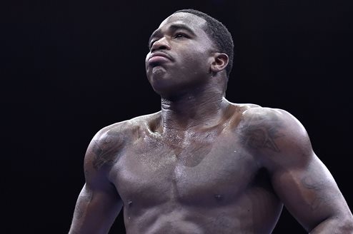 Adrien Broner walks back to his corner during his welterweight boxing bout against Shawn Porter on Saturday, June 20, 2015, in Las Vegas. Porter won by unanimous decision. (AP Photo/David Becker)