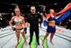 BROOKLYN, NEW YORK - FEBRUARY 11: (R-L) Germaine de Randamie of The Netherlands celebrates her victory over Holly Holm in their women's featherweight championship bout during the UFC 208 event inside Barclays Center on February 11, 2017 in Brooklyn, New York. (Photo by Jeff Bottari/Zuffa LLC/Zuffa LLC via Getty Images)