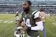 New York Jets cornerback Darrelle Revis walks on the field after an NFL football game against the Buffalo Bills, Sunday, Jan. 1, 2017, in East Rutherford, N.J. The Jets won 30-10. (AP Photo/Bill Kostroun)