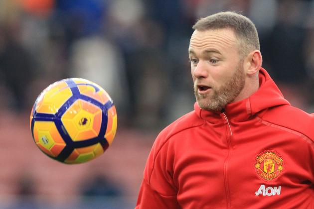 Manchester United's English striker Wayne Rooney warms up ahead of the English Premier League football match between Stoke City and Manchester United at the Bet365 Stadium in Stoke-on-Trent, central England on January 21, 2017. / AFP / Lindsey PARNABY / RESTRICTED TO EDITORIAL USE. No use with unauthorized audio, video, data, fixture lists, club/league logos or 'live' services. Online in-match use limited to 75 images, no video emulation. No use in betting, games or single club/league/player publications. / (Photo credit should read LINDSEY PARNABY/AFP/Getty Images)