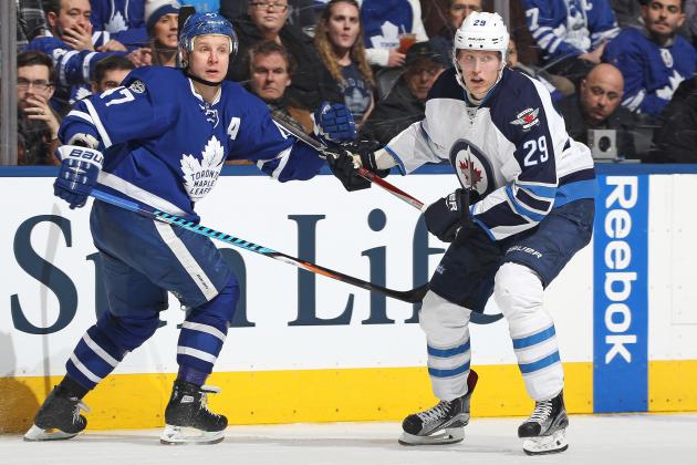 TORONTO,ON - FEBRUARY 21:  Patrik Laine #29 of the Winnipeg Jets skates against Leo Komarov #47 of the Toronto Maple Leafs during an NHL game at Air Canada Centre on February 21, 2017 in London, Ontario, Canada. The Maple Leafs defeated the Jets 5-4 in overtime. (Photo by Claus Andersen/Getty Images)