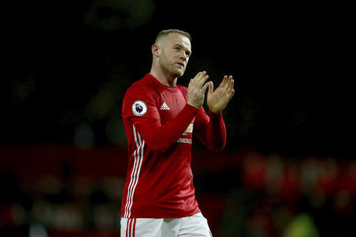 Manchester United's Wayne Rooney leaves the field after the English Premier League soccer match between Manchester United and Liverpool at Old Trafford stadium in Manchester, England, Sunday, Jan. 15, 2017. (AP Photo/Dave Thompson)