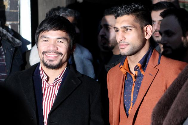 LONDON, ENGLAND - JANUARY 23:  Manny Pacquiao and Amir Khan pose after holding discussions about the possibility of a future fight, at Fitzroy Lodge Amateur Boxing Club on January 23, 2015 in London, England.  (Photo by Martin Willetts/Getty Images)