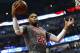 CHICAGO, IL - DECEMBER 19: Taj Gibson #22 of the Chicago Bulls rebounds against the Detroit Pistons at the United Center on December 19, 2016 in Chicago, Illinois. (Photo by Jonathan Daniel/Getty Images)