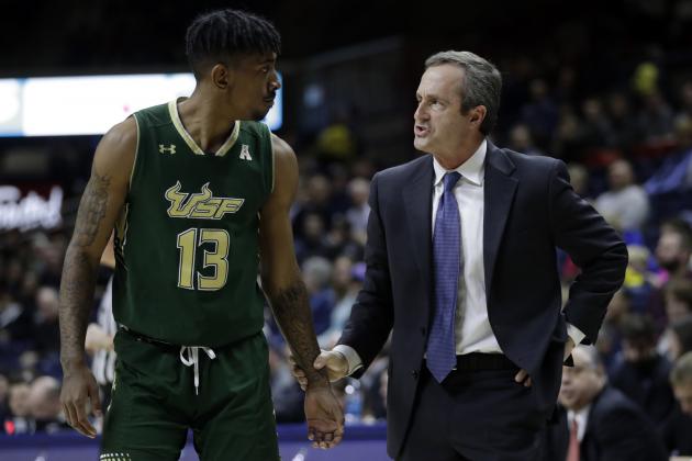 Feb 8, 2017; Storrs, CT, USA; South Florida Bulls interim head coach Murry Bartow talks with guard Geno Thorpe (13) as they take on the Connecticut Huskies in the first half at Harry A. Gampel Pavilion. Mandatory Credit: David Butler II-USA TODAY Sports
