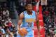 LOS ANGELES, CA - DECEMBER 20: Kenneth Faried #35 of the Denver Nuggets brings the ball up court during the game against the Los Angeles Clippers on December 20, 2016 at STAPLES Center in Los Angeles, California. NOTE TO USER: User expressly acknowledges and agrees that, by downloading and/or using this Photograph, user is consenting to the terms and conditions of the Getty Images License Agreement. Mandatory Copyright Notice: Copyright 2016 NBAE (Photo by Andrew D. Bernstein/NBAE via Getty Images)