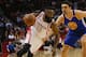 HOUSTON, TX - JANUARY 20: James Harden #13 of the Houston Rockets drives around Zaza Pachulia #27 of the Golden State Warriors in the first quarter at Toyota Center on January 20, 2017 in Houston, Texas. NOTE TO USER: User expressly acknowledges and agrees that, by downloading and/or using this photograph, user is consenting to the terms and conditions of the Getty Images License Agreement. (Photo by Bob Levey/Getty Images)