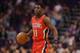 PHOENIX, AZ - FEBRUARY 13: Jrue Holiday #11 of the New Orleans Pelicans handles the ball during the first half of the NBA game against the Phoenix Suns at Talking Stick Resort Arena on February 13, 2017 in Phoenix, Arizona. NOTE TO USER: User expressly acknowledges and agrees that, by downloading and or using this photograph, User is consenting to the terms and conditions of the Getty Images License Agreement. (Photo by Christian Petersen/Getty Images)