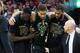 CLEVELAND, OH - FEBRUARY 27: Thon Maker #7 and Greg Monroe #15 help Michael Beasley #9 of the Milwaukee Bucks off the court after Beasley was injured during the first half against the Cleveland Cavaliers at Quicken Loans Arena on February 27, 2017 in Cleveland, Ohio. NOTE TO USER: User expressly acknowledges and agrees that, by downloading and/or using this photograph, user is consenting to the terms and conditions of the Getty Images License Agreement. (Photo by Jason Miller/Getty Images)
