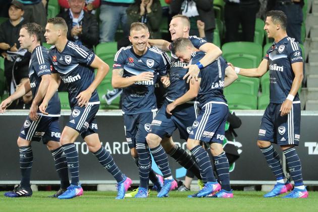 MELBOURNE, AUSTRALIA - FEBRUARY 25:  Marco Rojas of the Victory is congratulated by Besart Berisha and his teammates after scoring the first goal during the round 21 A-League match between Melbourne Victory and Adelaide United at AAMI Park on February 25, 2017 in Melbourne, Australia.  (Photo by Scott Barbour/Getty Images)