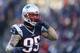 FOXBORO, MA - DECEMBER 04: Chris Long #95 of the New England Patriots reacts after sacking Jared Goff #16 of the Los Angeles Rams (not pictured) during the fourth quarter at Gillette Stadium on December 4, 2016 in Foxboro, Massachusetts. (Photo by Maddie Meyer/Getty Images)