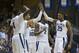 PHILADELPHIA, PA - FEBRUARY 25: Eric Paschall #4, Josh Hart #3, Donte DiVincenzo #10, Kris Jenkins #2, and Mikal Bridges #25 of the Villanova Wildcats celebrate in the second half against the Creighton Bluejays at the Pavilion on February 25, 2017 in Villanova, Pennsylvania. The Wildcats defeated the Bluejays 79-63. (Photo by Mitchell Leff/Getty Images)