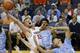 Virginia center Jack Salt (33) reaches for a rebound over North Carolina forward Justin Jackson (44) during the first half of an NCAA college basketball game in Charlottesville, Va., Monday, Feb. 27, 2017. (AP Photo/Steve Helber)