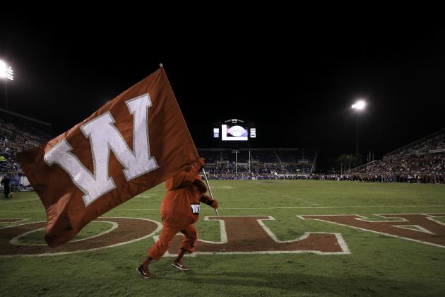 BOCA RATON, FL - DECEMBER 20: The Western Kentucky Hilltoppers mascot Big Red carries a flag during the game against the Memphis Tigers at FAU Stadium on December 20, 2016 in Boca Raton, Florida. (Photo by Rob Foldy/Getty Images)