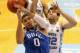 CHAPEL HILL, NC - MARCH 04: Teammates Tony Bradley #5 and Luke Maye #32 of the North Carolina Tar Heels try to stop Jayson Tatum #0 of the Duke Blue Devils during their game at the Dean Smith Center on March 4, 2017 in Chapel Hill, North Carolina. (Photo by Streeter Lecka/Getty Images)
