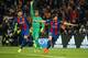 BARCELONA, SPAIN - MARCH 8: Sergi Roberto of FC Barcelona (right) celebrates his winning goal for Barca with Gerard Pique (left) while goalkeeper of PSG Kevin Trapp (center) gestures during the UEFA Champions League Round of 16 second leg match between FC Barcelona and Paris Saint-Germain (PSG) at Camp Nou on March 8, 2017 in Barcelona, Spain. (Photo by Jean Catuffe/Getty Images)