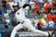 NEW YORK, NY - JULY 23: Aroldis Chapman #54 of the New York Yankees delivers a pitch in the ninth inning against the San Francisco Giants on July 23, 2016 at Yankee Stadium in the Bronx borough of New York City. (Photo by Elsa/Getty Images)