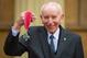 LONDON, ENGLAND - MARCH 15: Motor racing legend John Surtees with his Commander of the Order of the British Empire (CBE) medal which was awarded by the Duke of Cambridge at an investiture ceremony at Buckingham Palace on March 15, 2015 in London, England. (Photo by Dominic Lipinski - WPA Pool/Getty Images)