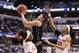INDIANAPOLIS, IN - APRIL 03: Kelsey Plum #10 of the Washington Huskies shoots against Julia Chandler #3 and Bria Day #55 of the Syracuse Orange in the first quarter during the semifinals of the 2016 NCAA Women's Final Four Basketball Championship at Bankers Life Fieldhouse on April 3, 2016 in Indianapolis, Indiana. (Photo by Andy Lyons/Getty Images)