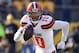 FILE - In this Jan. 1, 2017, file photo, Cleveland Browns quarterback Robert Griffin III (10) rolls out as he looks to pass during the first half of an NFL football game against the Pittsburgh Steelers, in Pittsburgh . A person familiar with the decision says the Browns are releasing quarterback Robert Griffin III after one injury-marred season. Griffin is being let go one day before he would have been due a $750,000 roster bonus, said the person who spoke Friday, March 10, 2017, to the Associated Press on condition of anonymity because the team has not announced the move. (AP Photo/Don Wright, File)